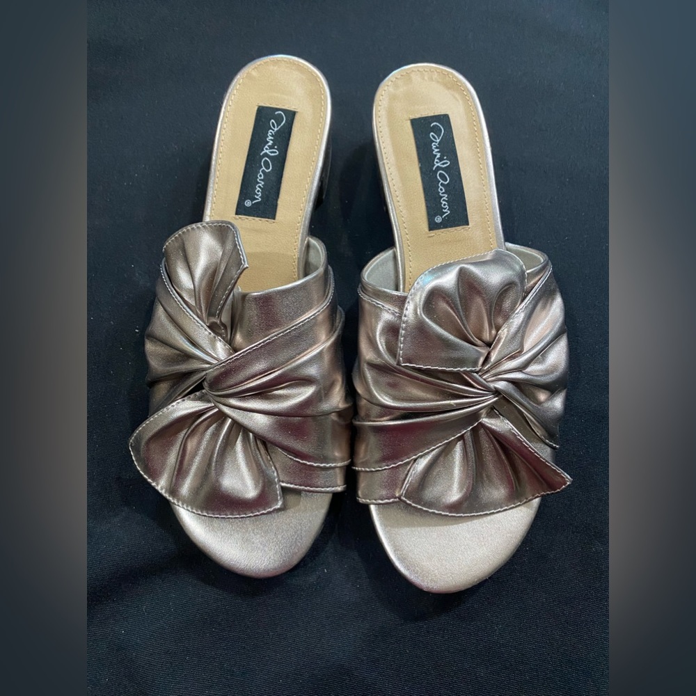 Rose gold David Aaron sandals.